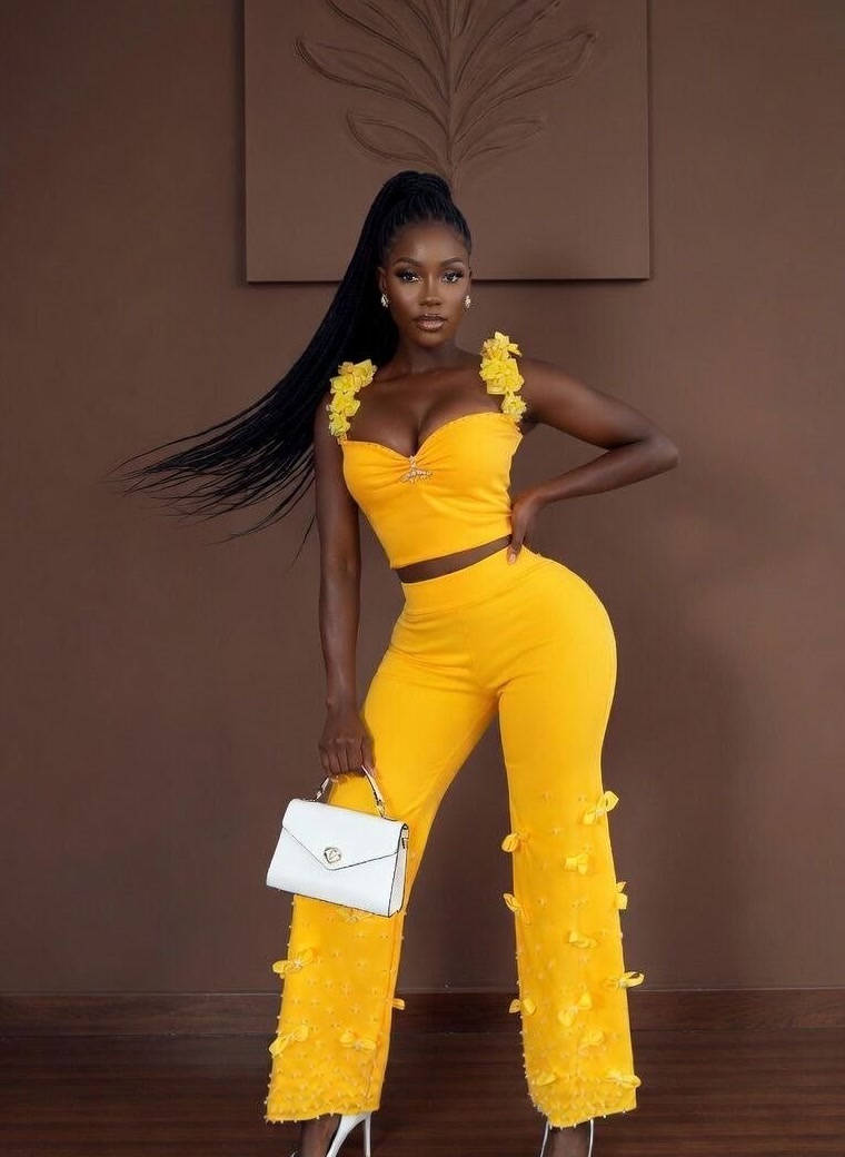 Yellow two-piece set with floral shoulder and trouser details